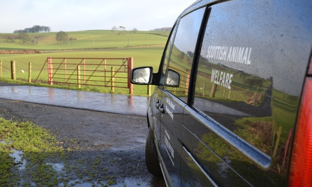 Scottish Animal Welfare vehicle beside fields in the countryside